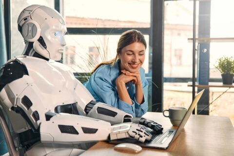 Risk Management related image- Woman working with artificial intelligence robot